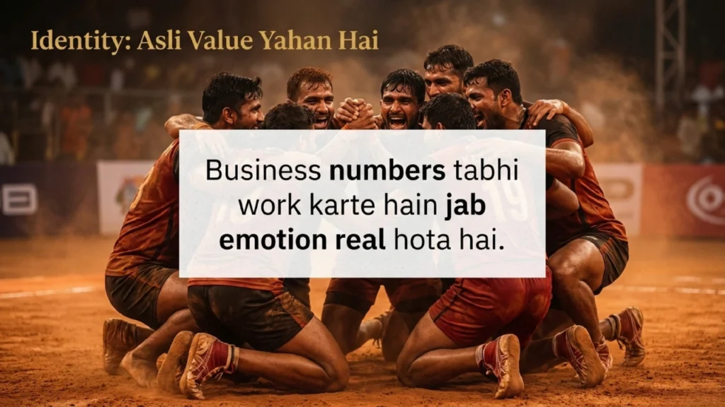 Kabaddi players celebrating together on the mat showing emotional team bond