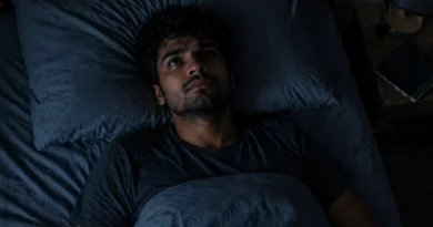 person lying awake at night overthinking insomnia india