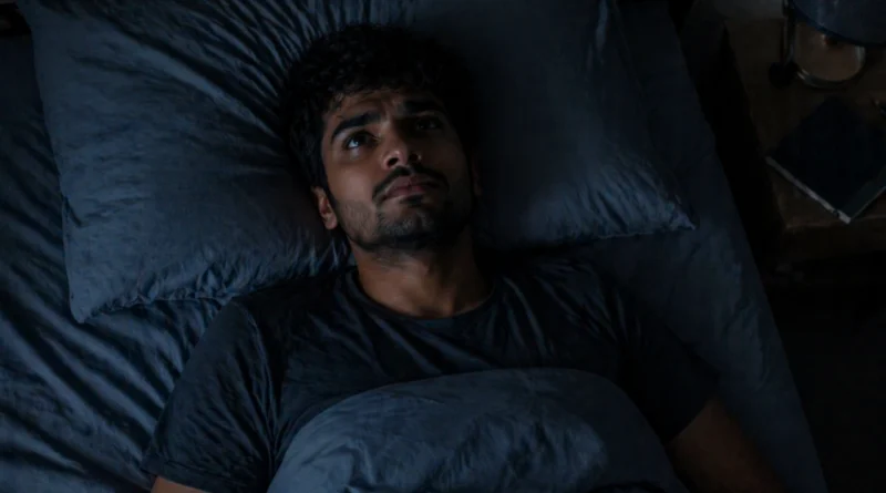 person lying awake at night overthinking insomnia india
