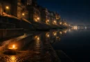 Banaras ghat at 2 AM with still Ganga and single diya on wet stone steps
