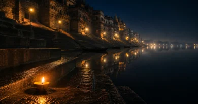 Banaras ghat at 2 AM with still Ganga and single diya on wet stone steps