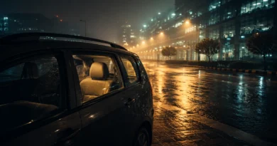 Foggy office cab parked outside Noida Sector 62 corporate buildings at night