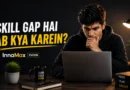 Young Indian graduate thinking about career skills and unemployment in modern workspace