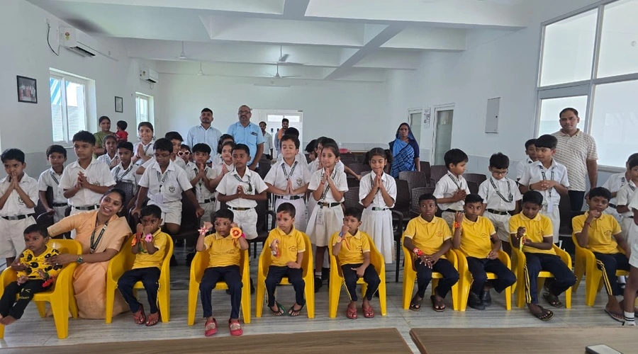 Students and children sharing rakhis during Raksha Bandhan celebration