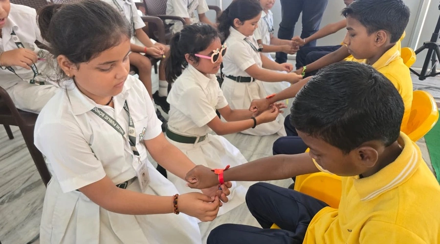 Students, teachers and children together after Raksha Bandhan celebration at Bal Grih