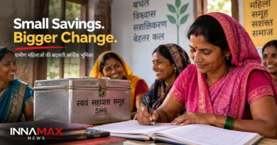 Rural Indian women managing a Self Help Group with a steel box and financial records